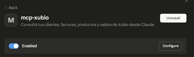 Claude Desktop: la extensión mcp-xubio instalada y habilitada, con el switch Enabled en ON